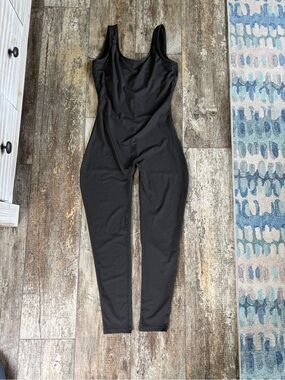 LA + Image black catsuit / Jumpsuit shelf bra criss cross back